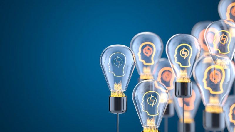 Image with multiple lightbulbs symbolizing thought leadership as providing value to your audience through your expertise, not about standing out from the crowd. 